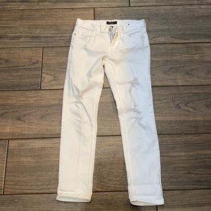 Distressed, ripped white skinny jeans